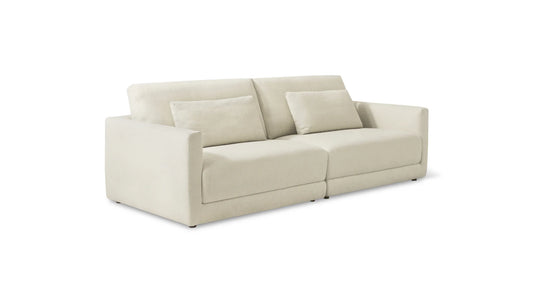 A contemporary beige Wind Down 4-Piece Modular Sectional featuring straight arms and two matching cushions. This sectional embodies a clean, minimalist design and is showcased against a plain white background.