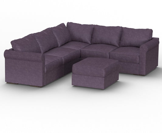 A spacious, dark gray Sactionals sofa made of Amethyst Corded Velvet with 6 seats and 8 sides comes with plush cushions and an ottoman, all set against a white backdrop. The L-shape design provides generous seating space.