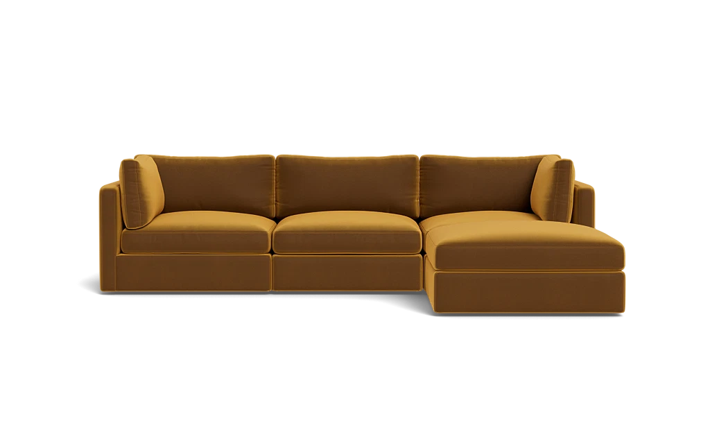 Introducing the Tatum Modular 3 Seat Chaise 106" Sectional, a modern sectional sofa in a striking mustard color. It features three seat cushions and an attached chaise lounge with clean lines, rectangular armrests, and a minimalist design set against a black background.