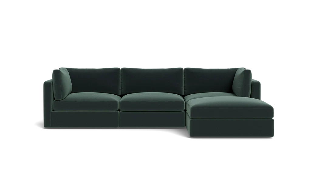 The Tatum Modular 3 Seat Chaise 106" Sectional is a dark green sofa with three seat cushions, a chaise on the right side, three back cushions, and two armrests against a solid black background.