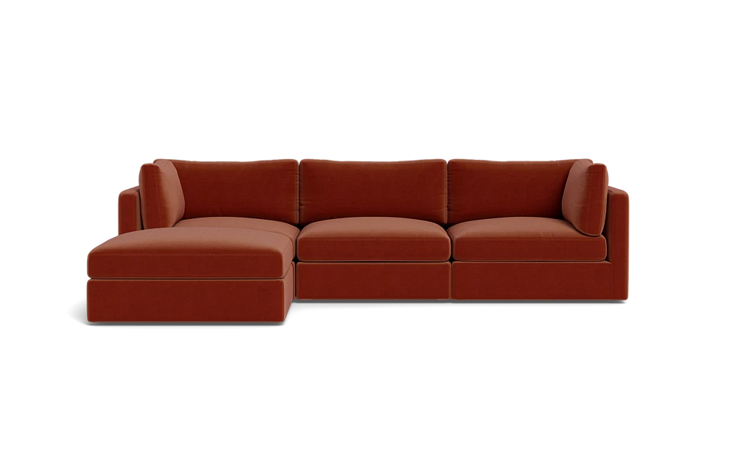 Introducing the Tatum Modular 3 Seat Chaise Sectional, a contemporary red-brown sofa with clean lines and a minimalist design, set against a solid black background. This sectional features a left-side chaise for an extended seating area.