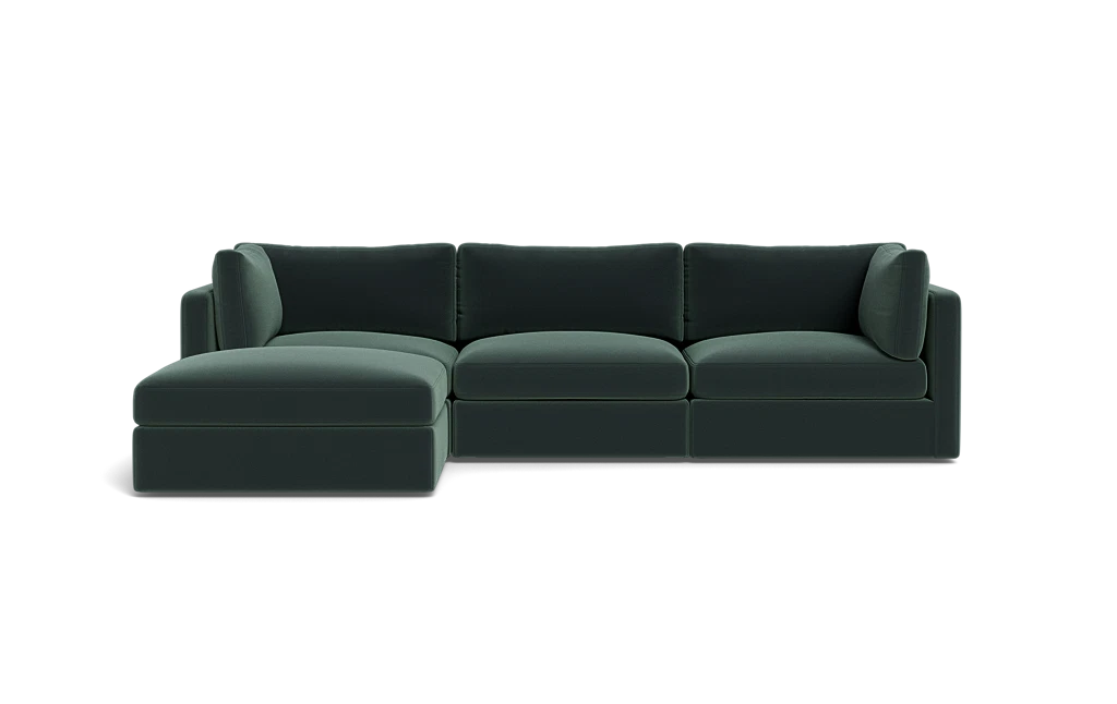 The Tatum Modular 3 Seat Chaise Sectional, featuring sleek cushions and a left-sided chaise in dark green, is set against a plain black background.