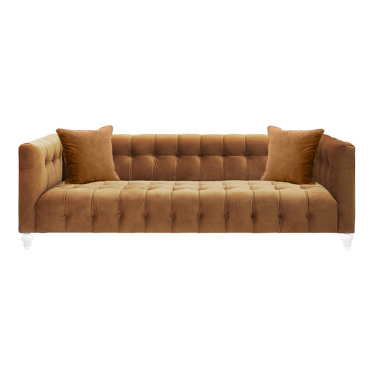 The Bea Velvet Tufted Sofa, upholstered in luxurious brown velvet, features a classic rectangular design with elegant white legs. It includes two matching square cushions and is set against a plain white background.