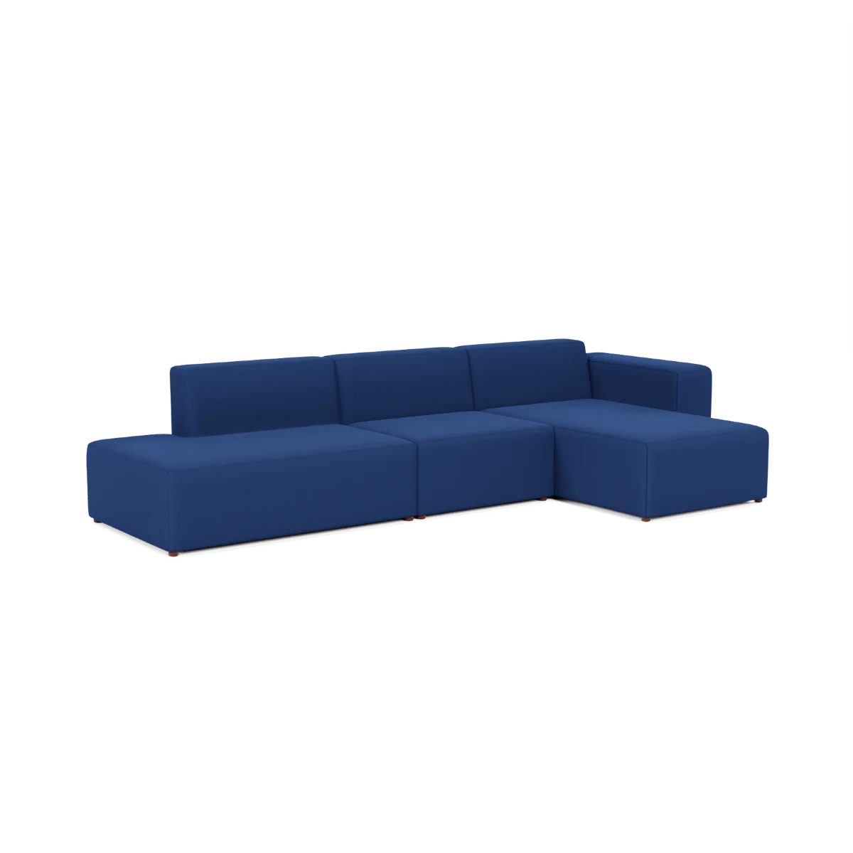 Introducing the Three-Seater Form Sectional, a stylish L-shaped sofa in a rich deep blue hue. This modern piece showcases clean lines and a low-profile design, offering spacious seating with plush cushions that perfectly complement any contemporary living room.