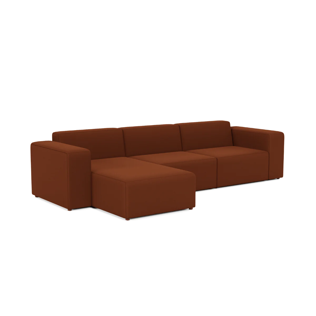 The Three-Seater Form Sectional is a modular brown sofa that includes three seats and a left-side chaise lounge. It boasts simple lines and blocky cushions, lending it a modern and minimalist aesthetic.