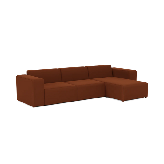 Introducing the Three-Seater Form Sectional: a contemporary, modular sofa in an elegant rich brown. It boasts a right-side chaise lounge, sleek lines, and low-profile armrests, perfect for modern living spaces.