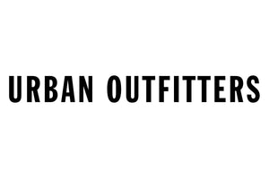 The image shows the text "Urban Outfitters" in bold, black capital letters on a plain white background.