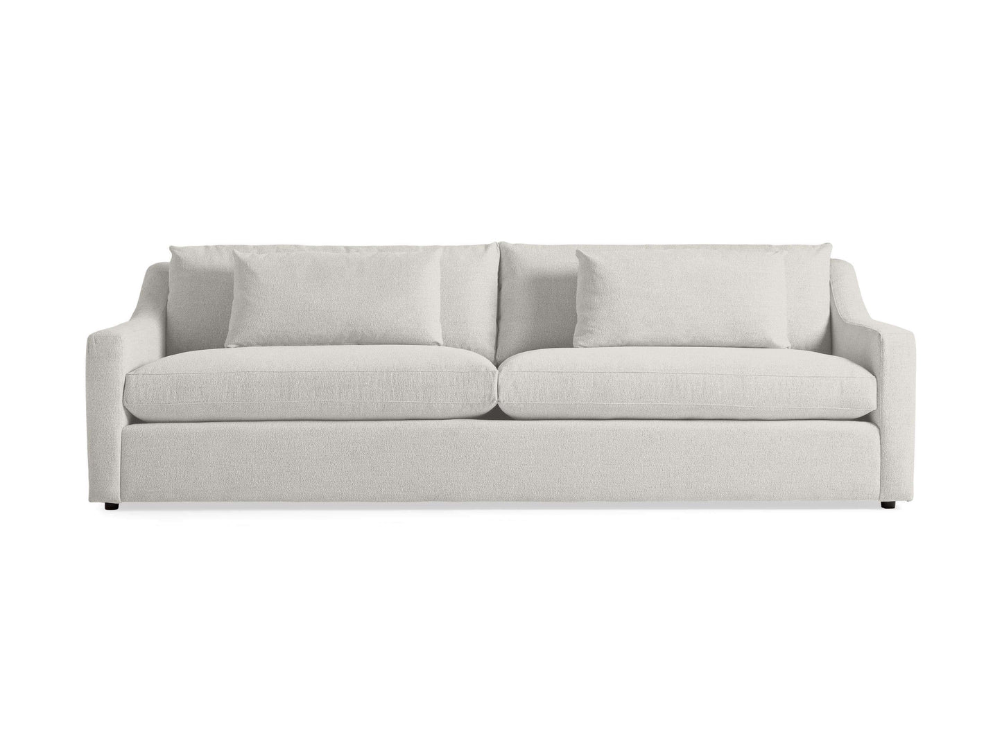 The Ashby Sofa, featuring a light gray design with two seat cushions and two large back cushions along with slightly curved armrests, is placed against a plain white background.