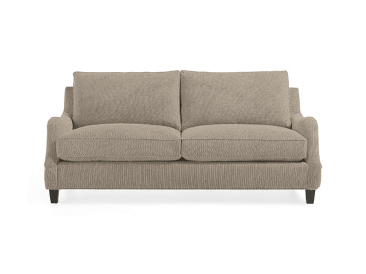 The Paxton 82" Sofa, in beige fabric, features two large seat cushions and two back cushions, complemented by subtly curved armrests and dark wooden legs, all displayed against a plain white background.