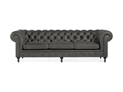 Introducing the Wessex Leather Sofa: a sophisticated Chesterfield sofa in dark gray, boasting three seat cushions and exquisitely tufted backrest. The design is accented by rolled arms, dark turned wooden legs, and an elegant classic style.