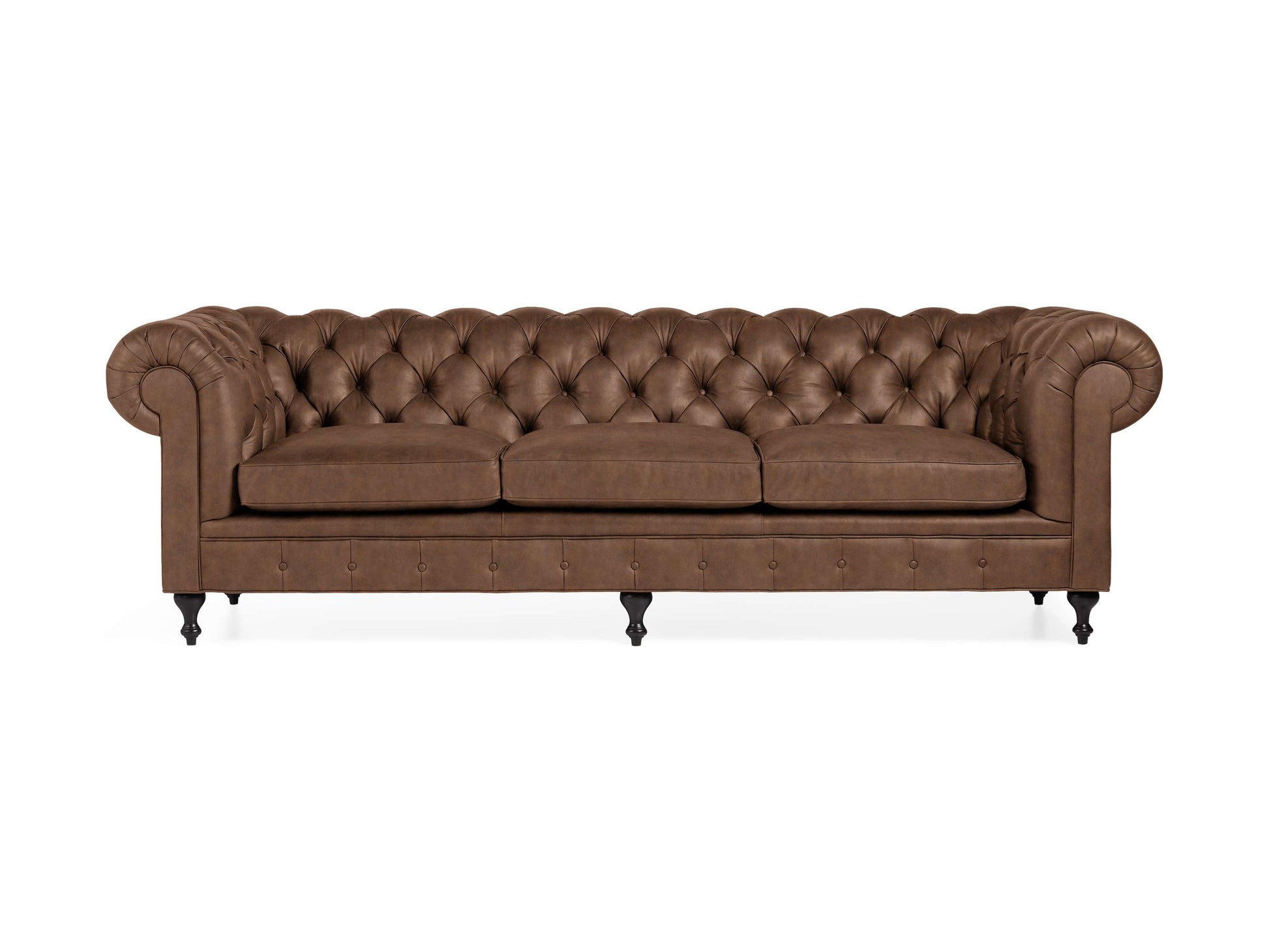 A Wessex Leather Sofa with a tufted back and seat cushions, featuring rolled arms and dark wooden legs.