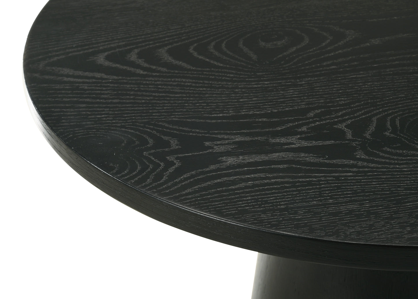 Close-up of the Jasper - Round Table, showcasing its round black wooden surface with a detailed grain pattern, emphasizing texture and natural wood design.