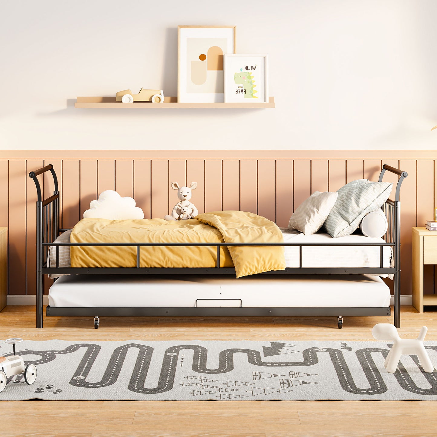 A children's bedroom features a black Daybed With Curved Handle Design And Trundle, yellow duvet, and decorative pillows, including a cloud-shaped one. A shelf above displays artwork and a wooden car. A play mat with a road design is on the floor.