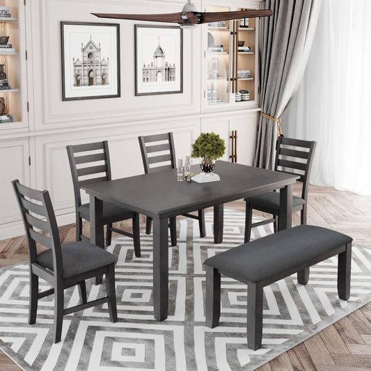 A dining room showcases a Rustic Wood Dining Set in gray, featuring a table, four chairs, and a bench. Beneath lies a geometric patterned rug. Light walls display framed art while shelves with decor and curtains complete the background. A modern ceiling fan is overhead.