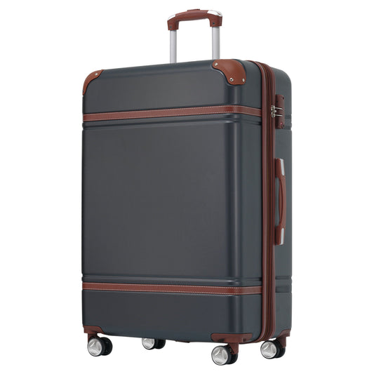 This sleek, dark gray Hardshell Luggage with brown accents, silver zippers, a retractable handle, and spinner wheels is designed for easy maneuverability.