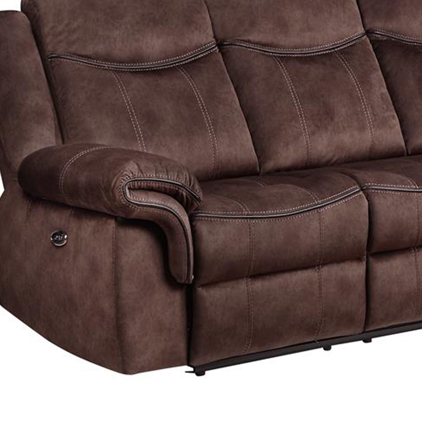 The Jimny - Domino Power Reclining Sofa, with visible stitching on its brown leather cushions and armrest, features a plush texture. Partially visible from the side, it highlights its padded design and reclining mechanism.