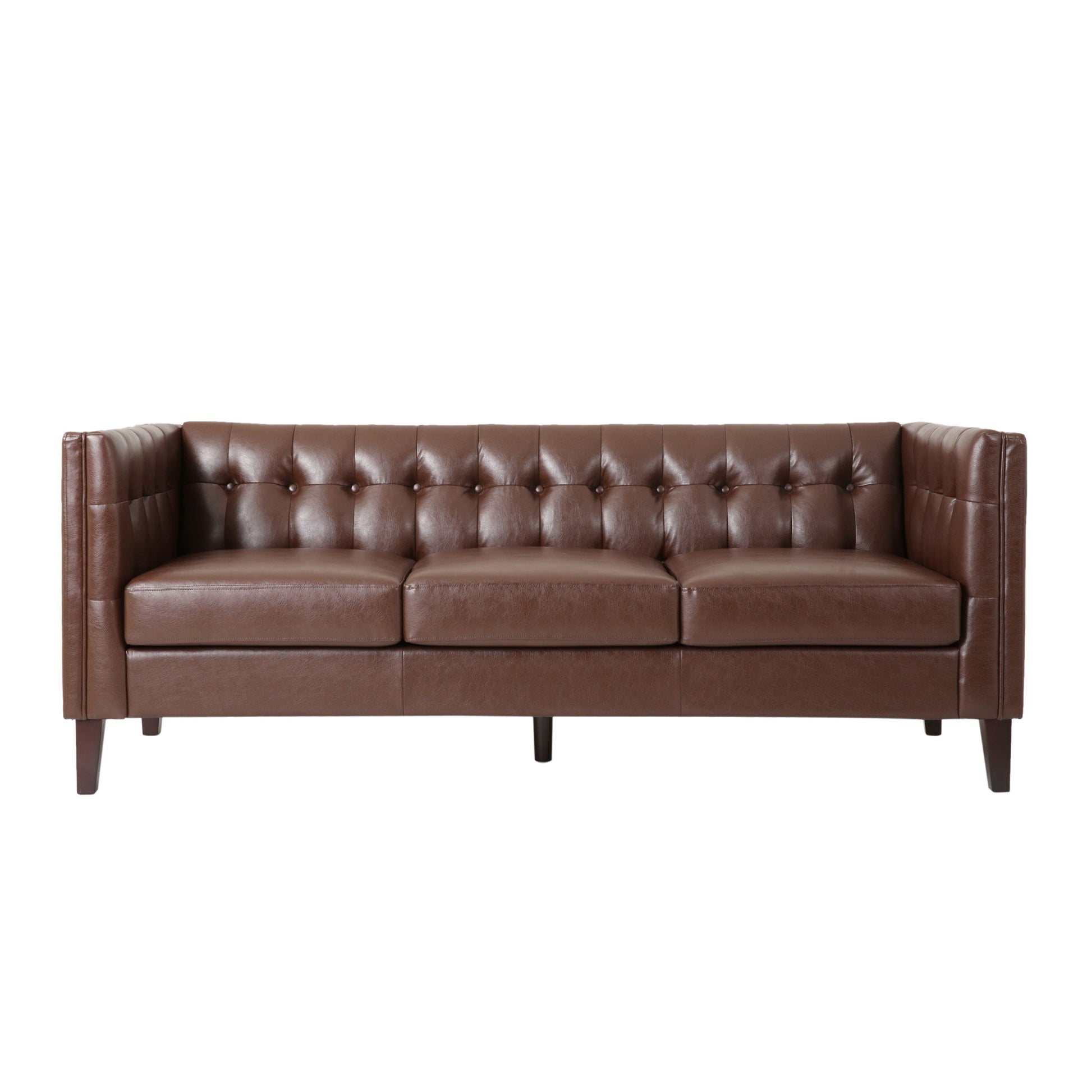 The Comfy 3 Seat Sofa features a modern tufted back, high arms, and brown leather upholstery. It has a classic design with dark wooden legs and a sleek rectangular shape, set against a plain white background.