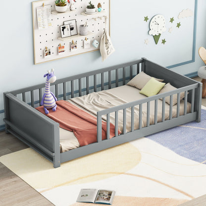 A cozy toddler bed with gray railings includes a giraffe plush toy, beige bedding, and a coral blanket. The room features a pegboard with decorations, cloud and moon wall decals, and a soft rug with an open book on it. The bed's built-in book storage rack adds functionality.