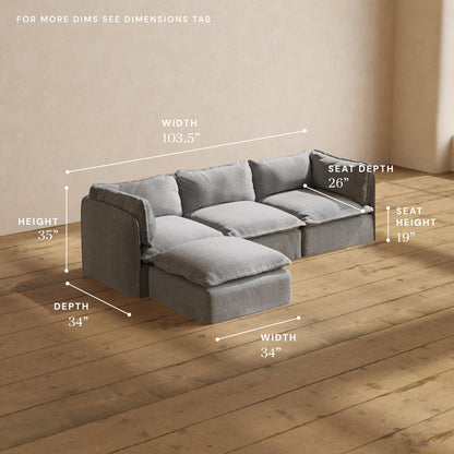 A Modular Performance 3-Seater Sectional in gray, featuring dimensions of width 103.5", depth 34", height 35", seat depth 26", and seat height 19". It’s situated on a wooden floor in a well-lit room.