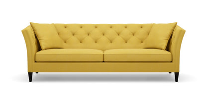 The Shelton 98" Sofa, with its bright yellow upholstery, button-tufted backrest and cushions, sloped arms, and black legs, is set against a plain white background.