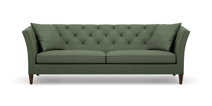 Introducing the Shelton 98" Sofa: This green, tufted sofa includes two seat cushions and two back pillows. It showcases a modern design with tall, angled armrests and tapered wooden legs.