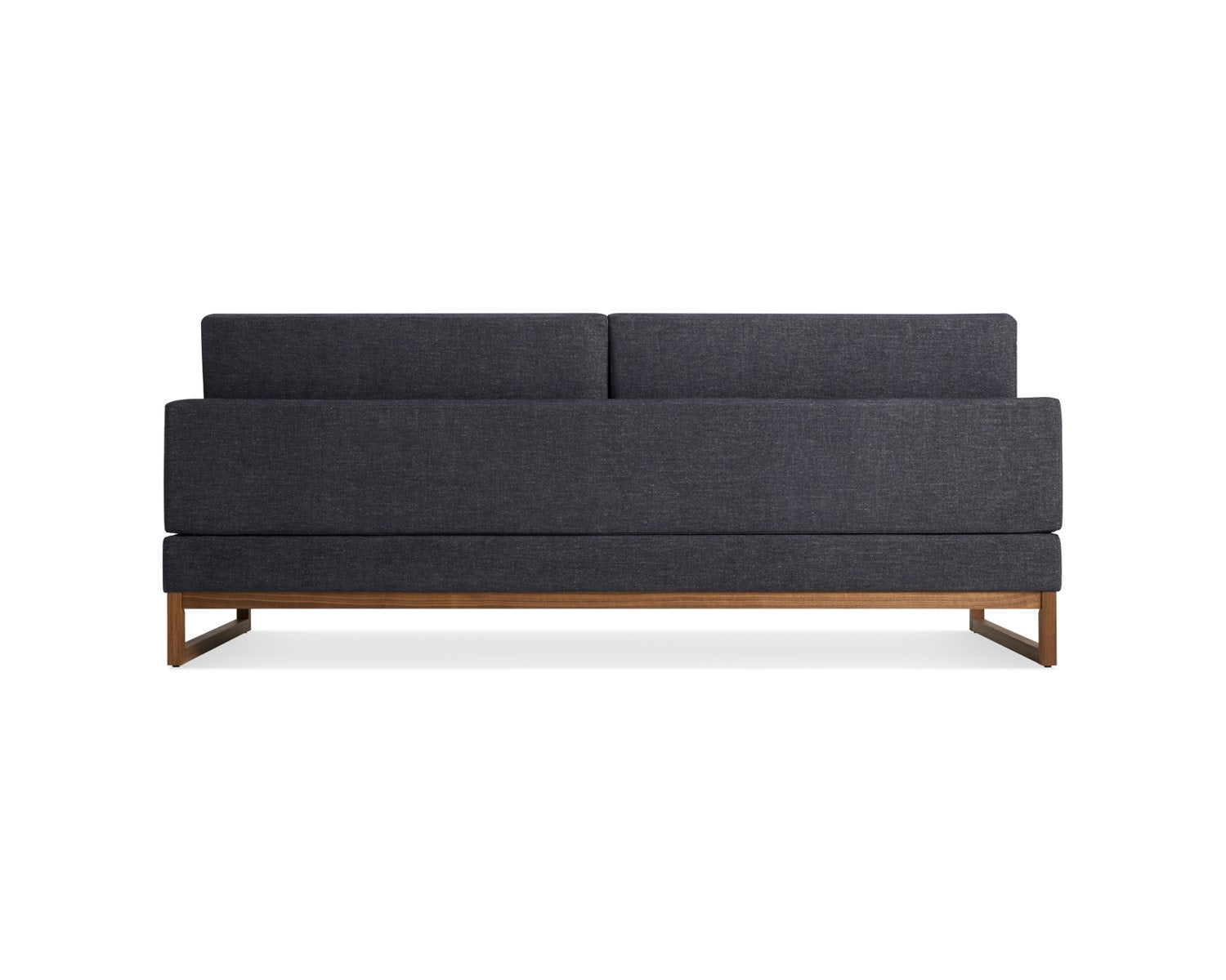 A modern, dark gray upholstered sofa viewed from the back, featuring two rectangular cushions and a wooden base with open sides. The design is minimalist and stylish, suitable for contemporary interiors.