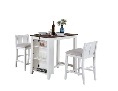 The Graham 3-Piece Counter Height Dining Set, featuring a white bar table with a dark wooden top and two stools, includes side shelves holding glasses and bottles. It's adorned with plates, cutlery, a wine bottle, glasses, and a small vase with greenery.