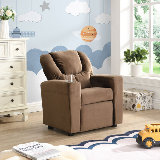 A black kids' recliner chair with dual cup holders and a footrest sits in a child's room. The wall features playful clouds and a planet. A toy box and yellow truck are on the floor, while natural light from the window illuminates the scene.