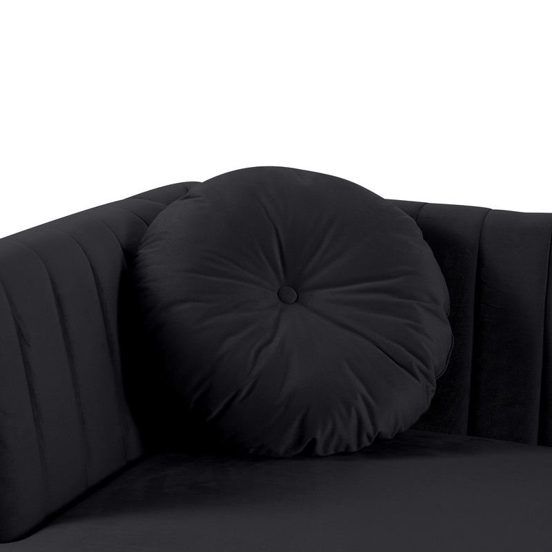 The Chloe Velvet Sectional Sofa Chaise, in black, features a plush round cushion with a central button detail. Its smooth and soft upholstery has vertically stitched seams for an enhanced design and includes a USB charging port.