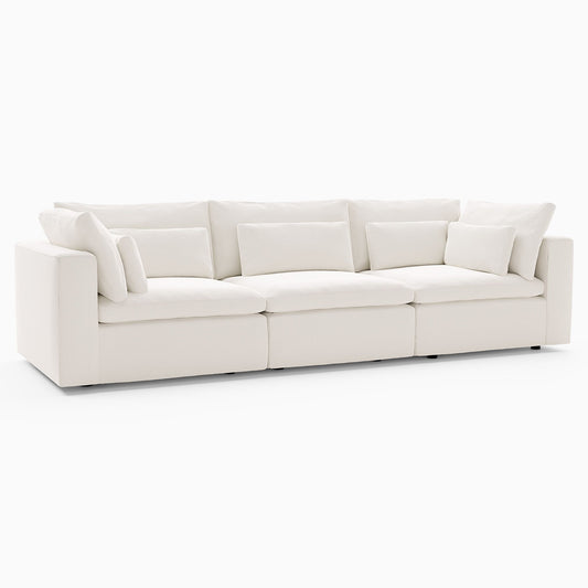 Presenting the Harmony Modular 3 Piece Sofa, a contemporary piece characterized by its sleek white design and plush cushions. This three-seater couch boasts square armrests and comes with extra throw pillows for added comfort, embodying a minimalist aesthetic on a white background.