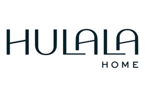 The image is a logo for "Hulala Home." The "Hulala" text is in large, stylized font, and the word "HOME" is in smaller, uppercase letters positioned below and to the right of "Hulala." The logo features a sleek, modern design with a black font on a white background.