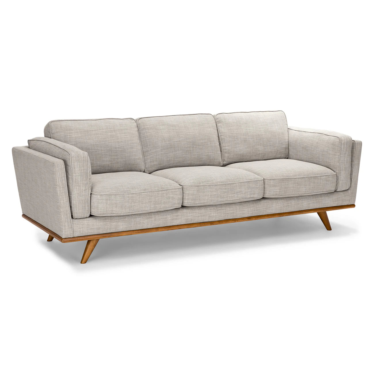 The Timber 90" Sofa is a mid-century modern piece featuring light gray fabric upholstery, with three seat cushions, three back cushions, and a wooden base with angled legs.