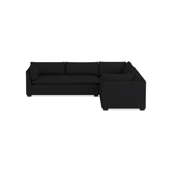 Introducing the Laguna 3-Piece L-Shape Loveseat Sectional, a black sectional sofa showcasing a modern design with three seat cushions. Its left side boasts an extended chaise section, while the right concludes with an armrest, all enveloped in a sleek and minimalist aesthetic.