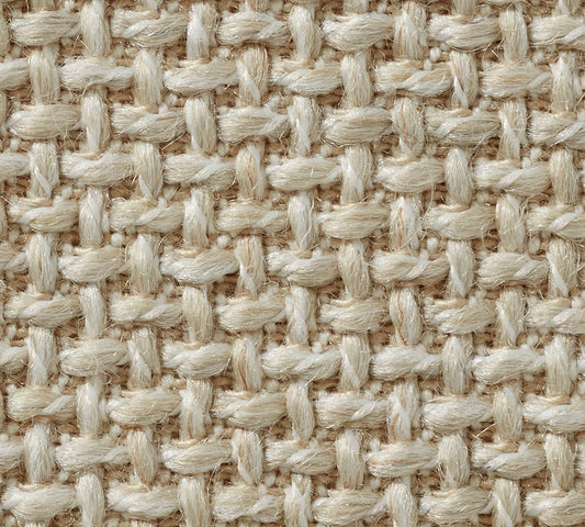 Close-up of the York Slope Arm Deep Slipcovered Sofa, showcasing its textured beige woven fabric with a crisscross pattern. The interlaced fibers create a sturdy and natural-looking surface.