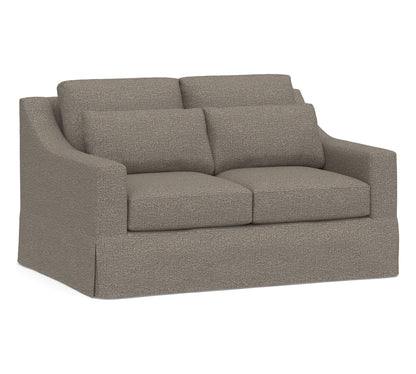 Introducing the York Slope Arm Deep Slipcovered Sofa: a two-seater upholstered in gray fabric with a modern design. It features plush cushions, sloping armrests, and a textured appearance for added style.