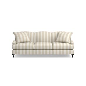 The Sanderson x Giles Deacon Bedford 87" Sofa is a cream-colored piece featuring vertical beige stripes, three cushions, and curved armrests, set against a white background.