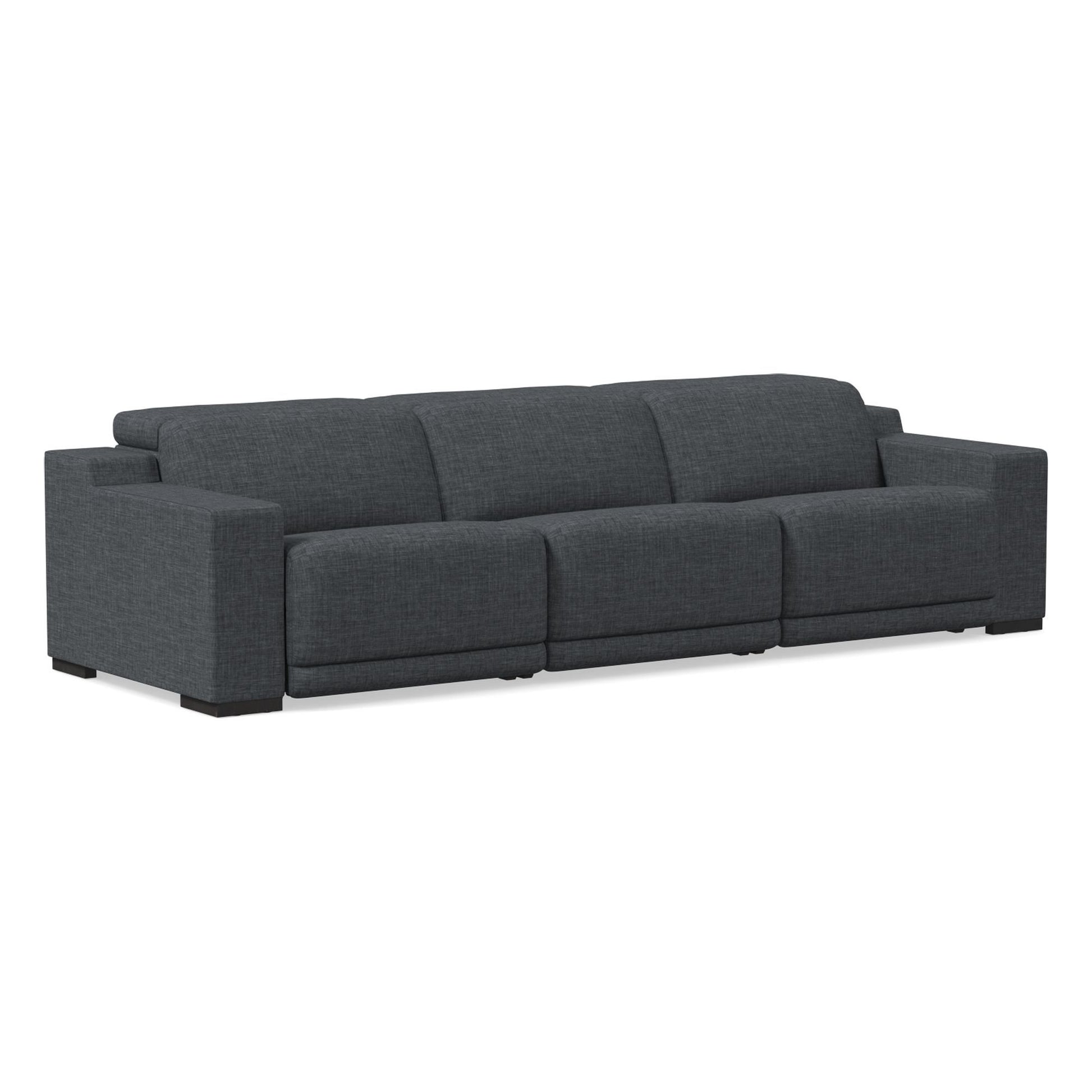 Introducing the Dalton Motion Sofa: a spacious, contemporary dark gray sectional featuring three plush cushions and broad armrests. Boasting a sleek design with a robust base and fabric texture, it's the perfect addition to any living room seating arrangement.