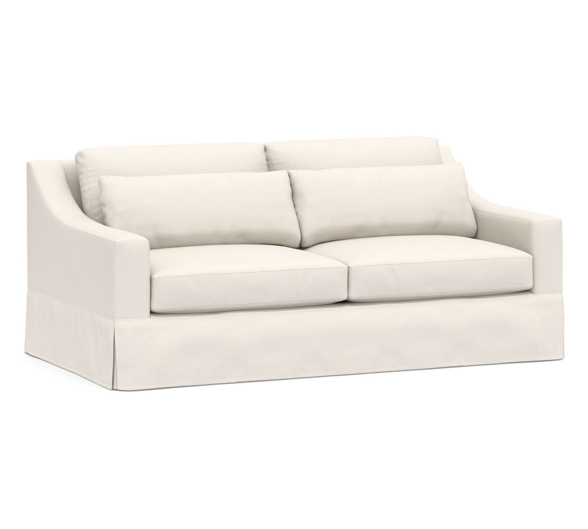 The York Slope Arm Deep Slipcovered Sofa is a white, upholstered loveseat featuring two back cushions and a tailored skirt around the base, set against a plain background.