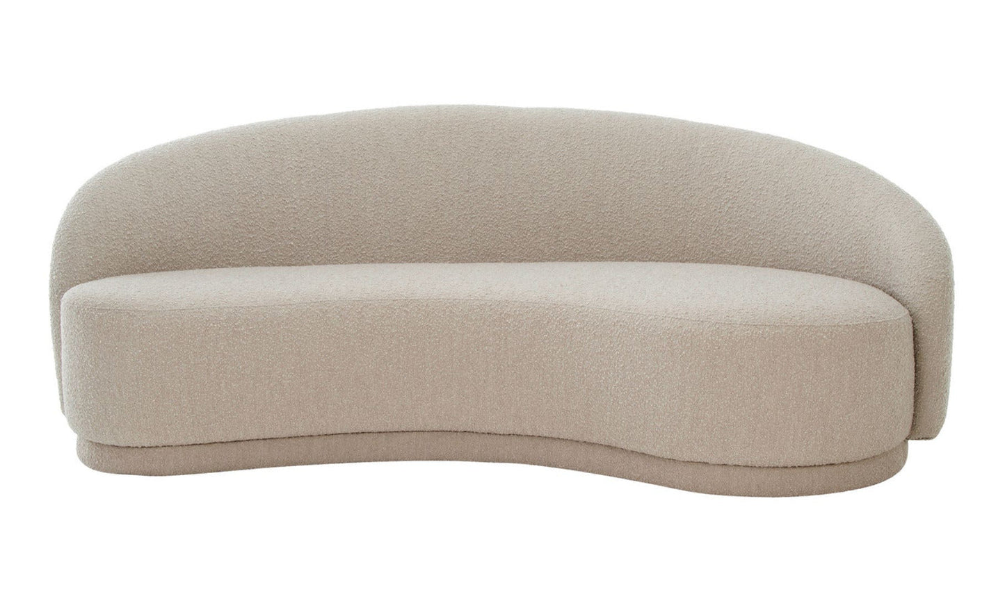 Introducing the Excelsior Sofa Cream, a contemporary, light beige upholstered piece with a sleek, curved design and minimalist aesthetic, offering a single continuous backrest and seat.