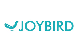 A teal-colored bird logo with the word "JOYBIRD" in uppercase letters to the right of the bird. The bird is standing on two legs with a raised tail. The design appears on a white background.