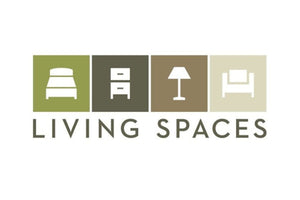 The image displays the Living Spaces logo, which consists of four square icons: a bed, a dresser, a lamp, and a chair, followed by the text "LIVING SPACES" in all capital letters. The icons and text are in muted green and brown tones.
