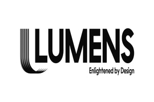 The image shows the logo of "LUMENS," a company. The word "LUMENS" is written in large, bold, black capital letters with a stylized "L" that has curved, feather-like lines extending from its base. Below it, the tagline "Enlightened by Design" is written in smaller text.