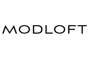 The image displays the word "MODLOFT" in black capital letters against a white background. The font is modern and sleek.