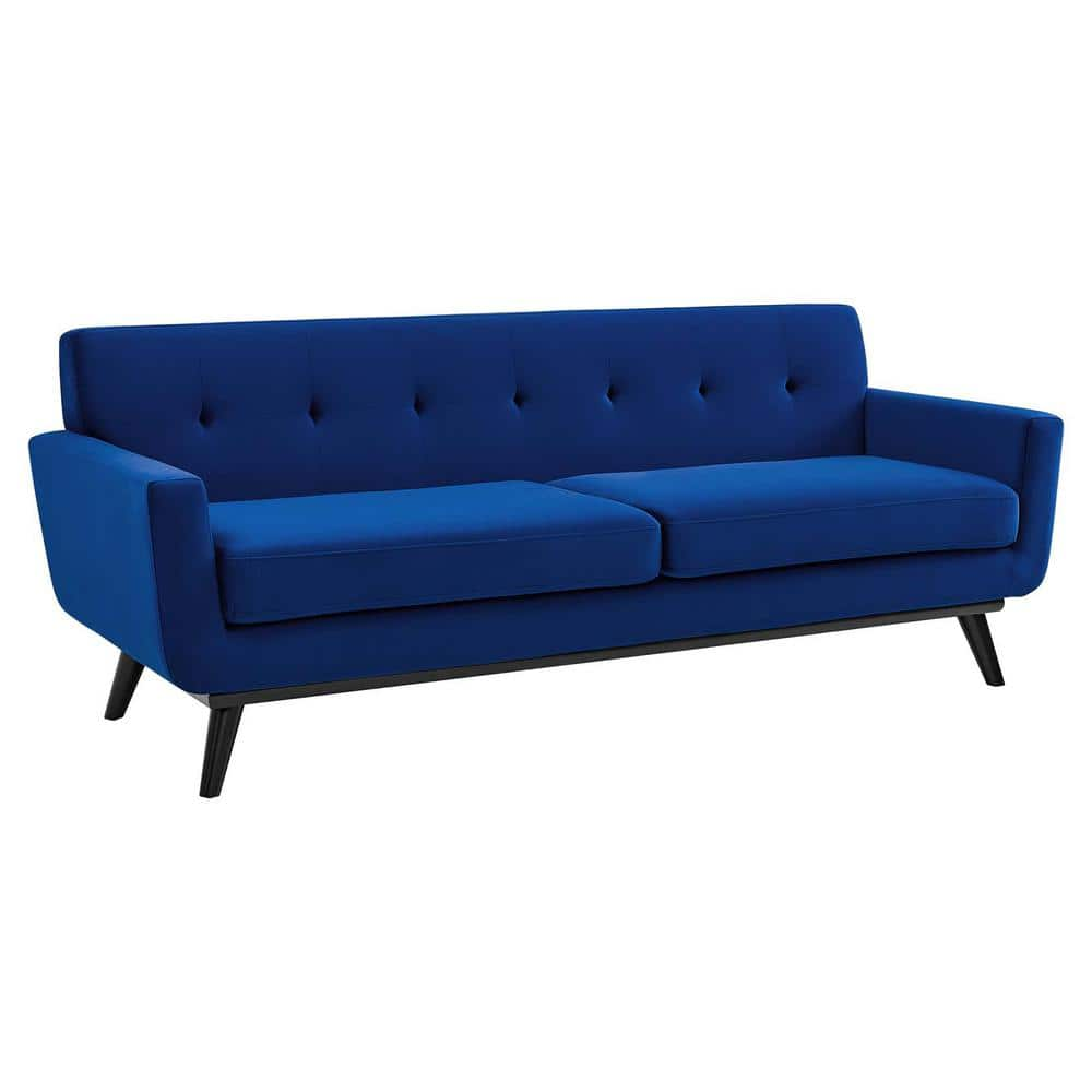 A modern, cognac-toned sofa with a mid-century design, the Engage Width 90.5 in. Performance Velvet Sofa features a tufted backrest, cushioned seating, and slanted black legs. Its sleek, minimalist appearance makes it ideal for contemporary interiors.