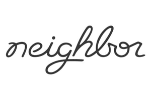 Stylized cursive text that reads "neighbor" in black on a white background. The letters are connected in a fluid, elegant script.
