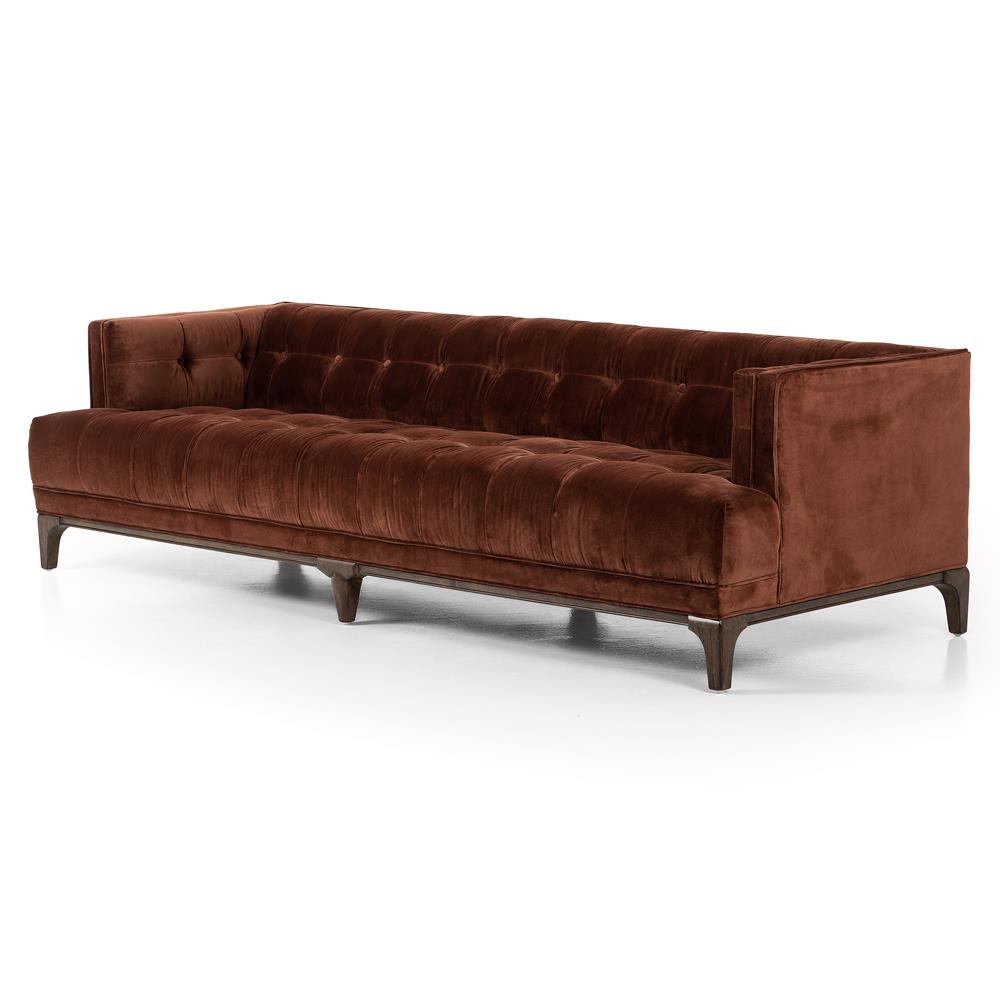 An Allen Mid Century green velvet sofa featuring a button-tufted back and a brown wood frame, showcased on a white background. The sofa boasts a modern design with squared arms and a clean, sleek silhouette.