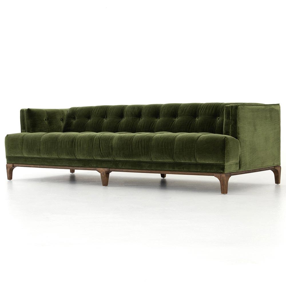 The Allen Mid Century Green Velvet Brown Wood Frame Button Tufted Sofa, featuring a stylish and modern design with tufted cushions and wooden legs, is showcased against a plain white background. Its sleek appearance and rich green color exude luxury and comfort.