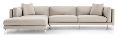 The Reade Sectional Sofa is a contemporary beige piece featuring sleek lines, metal legs, and three cushions. The chaise lounge extends to the left, offering a spacious seating arrangement.