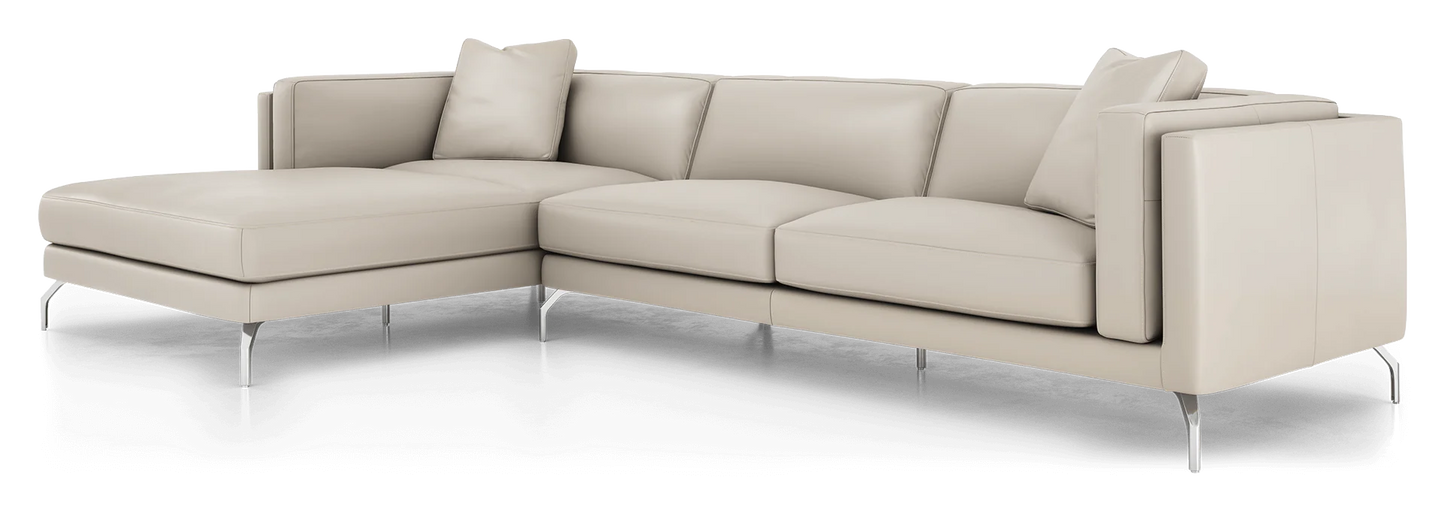 Introducing the Reade Sectional Sofa: a modern beige L-shaped sectional featuring sleek metal legs and plush cushions. Accentuated by two square throw pillows at the corners, it embodies a contemporary design.