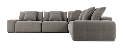 Introducing the Fullerton Modular Sofa 04: a contemporary gray sectional with six large cushions, showcasing tufted upholstery and a spacious, comfortable design. This L-shaped sofa is perfect for a modern living room setting.